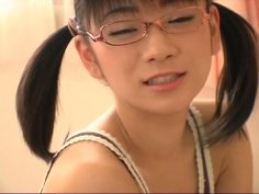 Japanese nerdy girl Ami Tokito in her pink bedroom